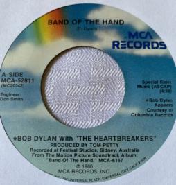 Band Of The Hand di Bob Dylan & The Heartbreakers - 45 giri Band Of The Hand di Bob Dylan & The Heartbreakers - 45 giri